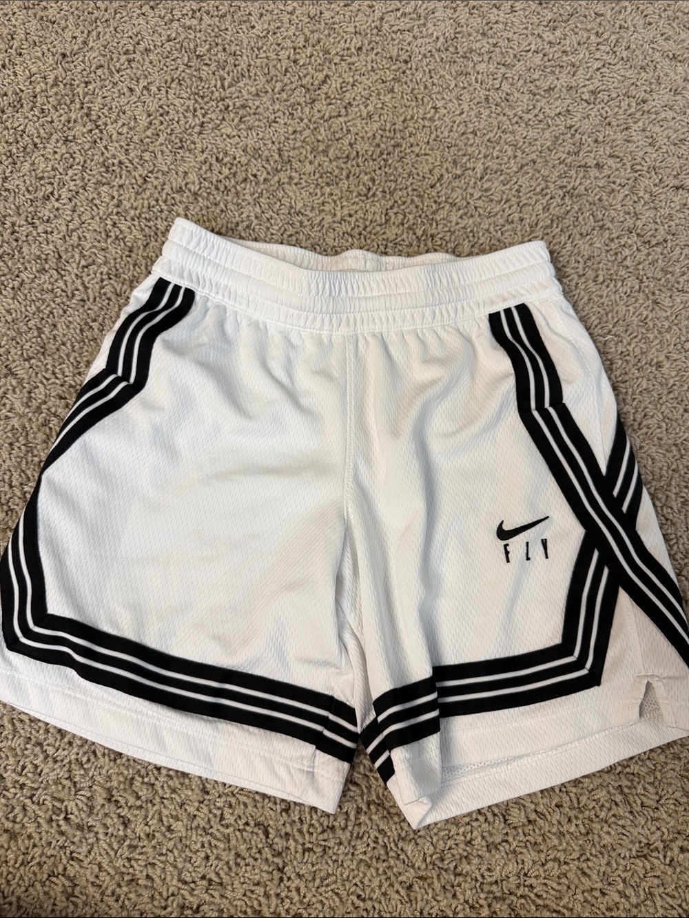 Nike White Athletic Shorts with Black Trim and Swoosh